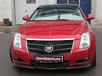 Cadillac CTS, замена линз на Hella 3R